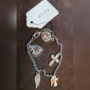 Inspirational charm bracelet silver with rose gold accents.